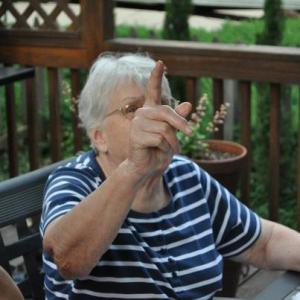 Mom -- I know she's saying "Don't you dare take a picture of me!"